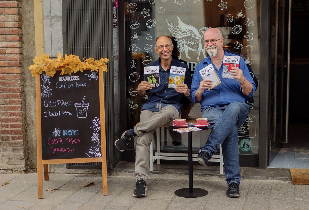 Three copies of Simply Sant Cugat magazine on a table